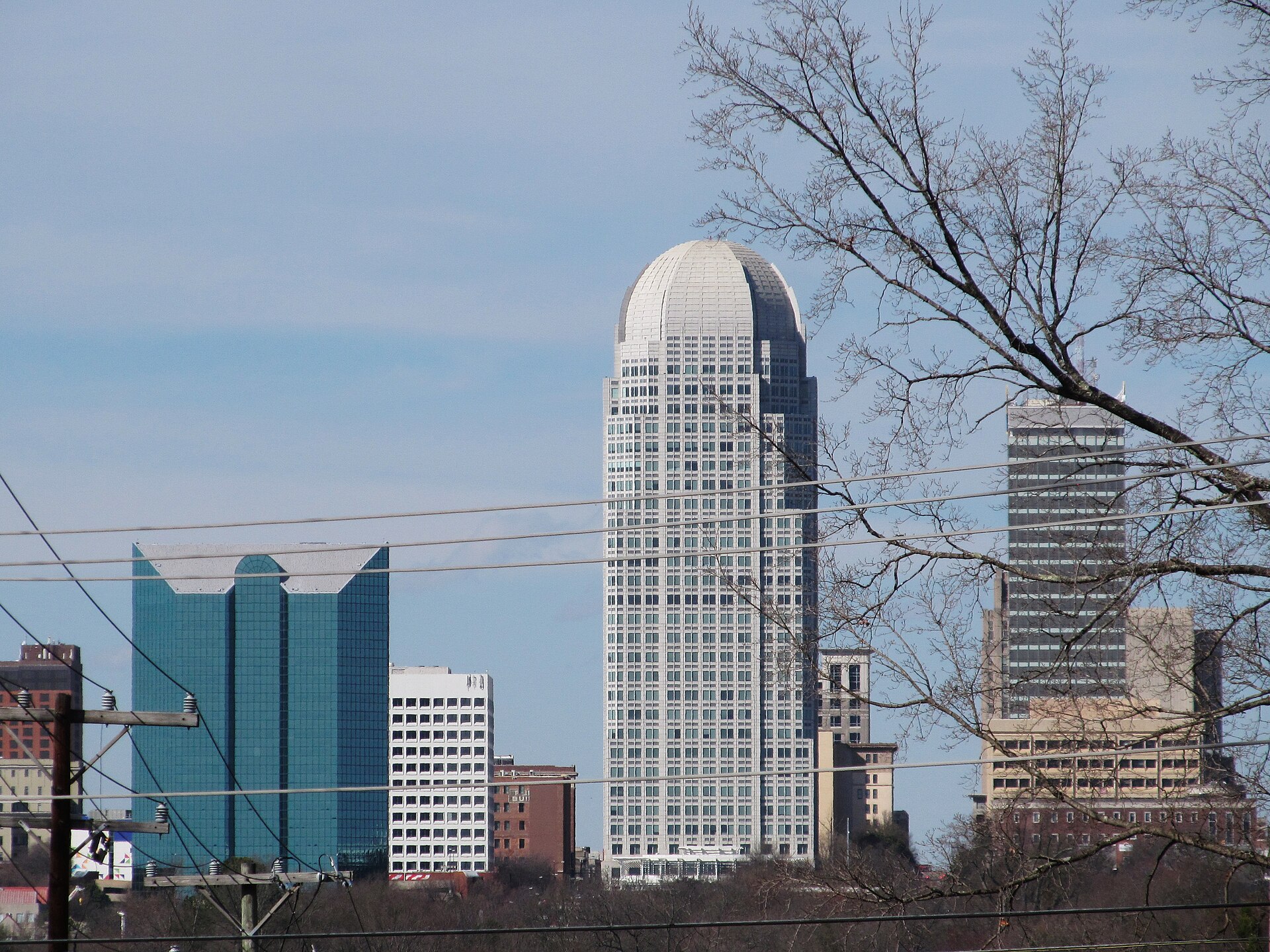 The Winston-Salem, North Carolina skyline, grounding the firm in its home region